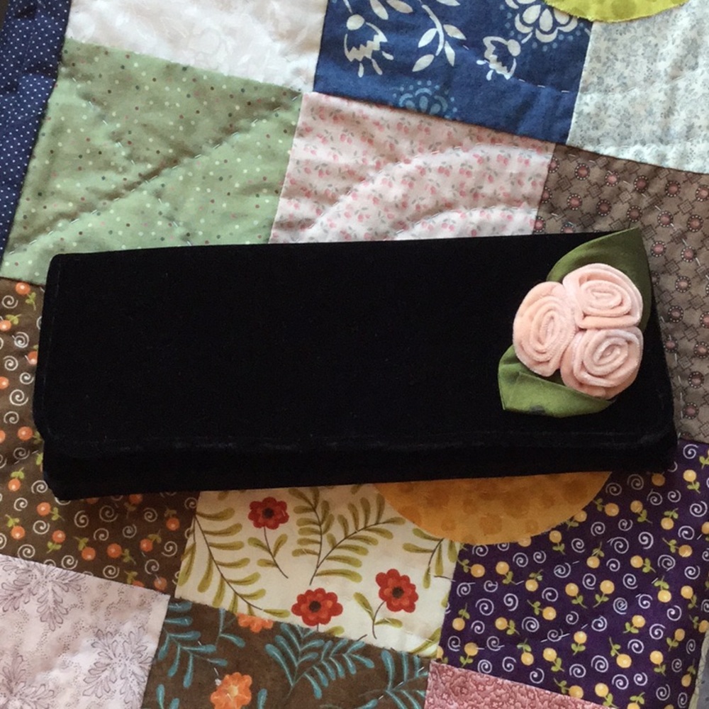 Women’s black velvet clutch